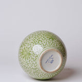 Green and White Porcelain Scrolling Lotus Globe Vase
